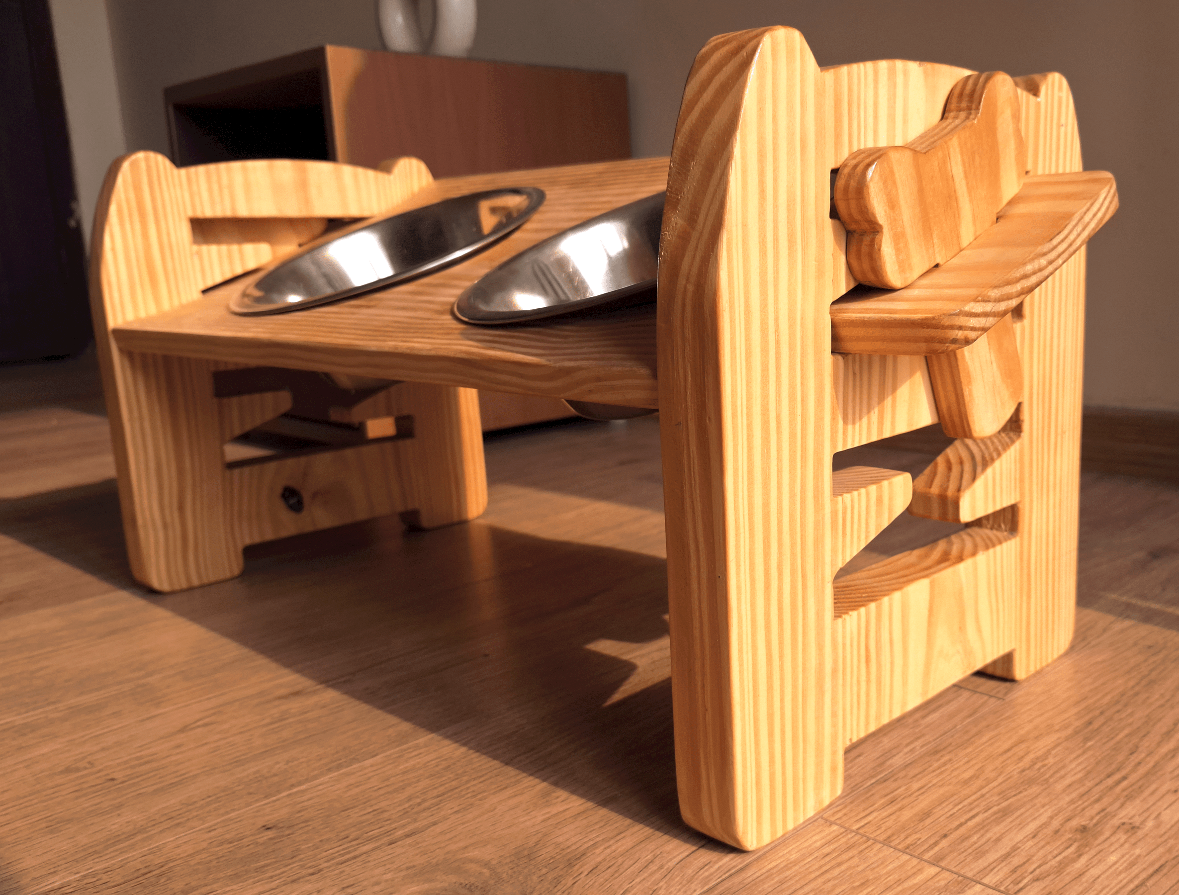 Handcrafted pinewood adjustable pet dining stand for small breeds, dual stainless steel bowls, and non-slip base for healthy posture | Pet bowls India