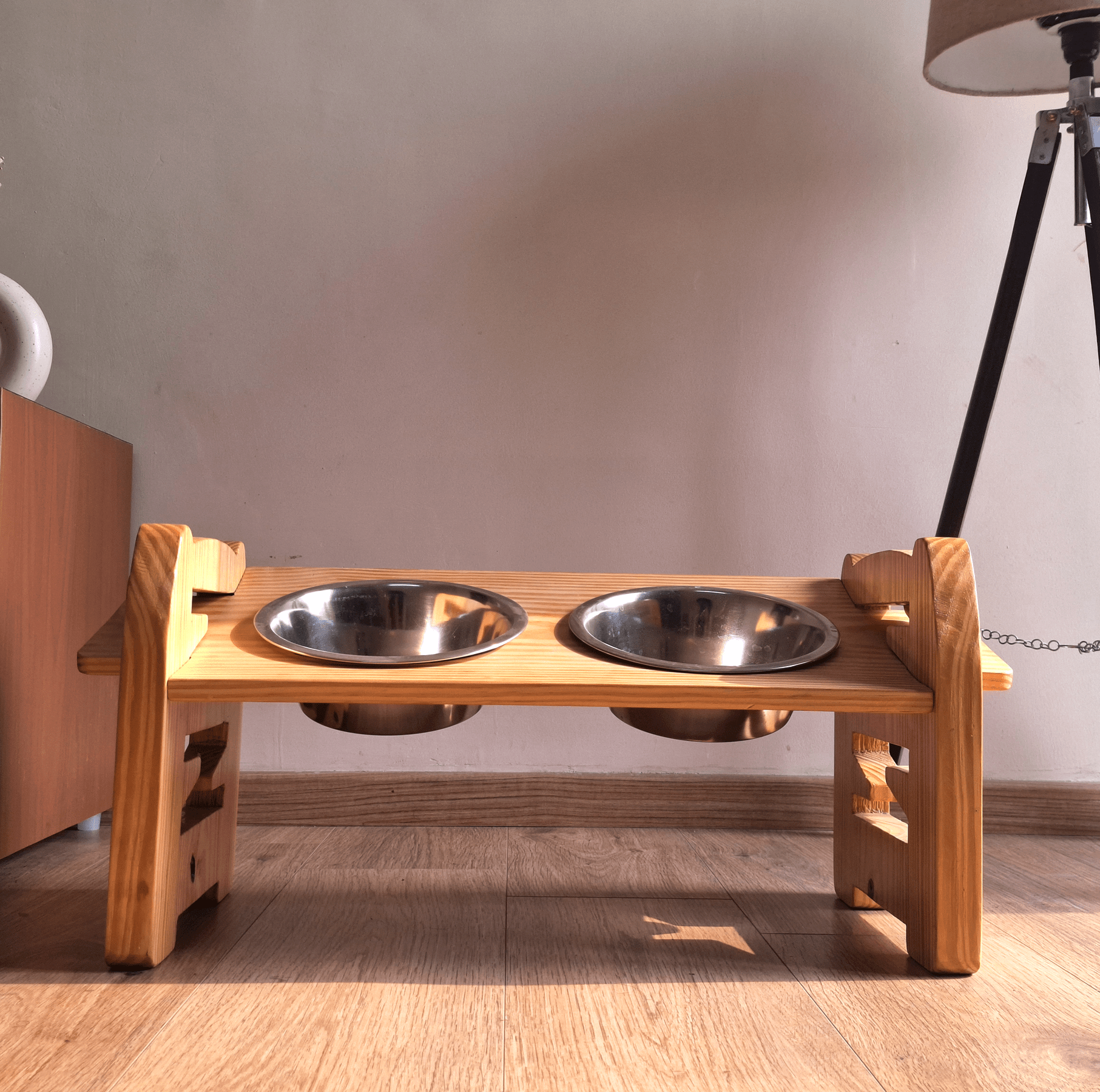 Handcrafted pinewood adjustable pet dining stand for small breeds, dual stainless steel bowls, and non-slip base for healthy posture | Pet bowls India