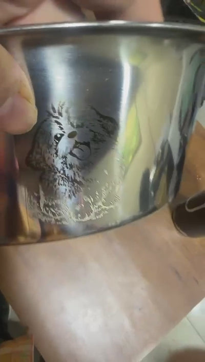 Video showing personalized stainless steel dog bowl being engraved with a pet’s name and photo using precision laser engraving | Luxury pet accessories India #color_black